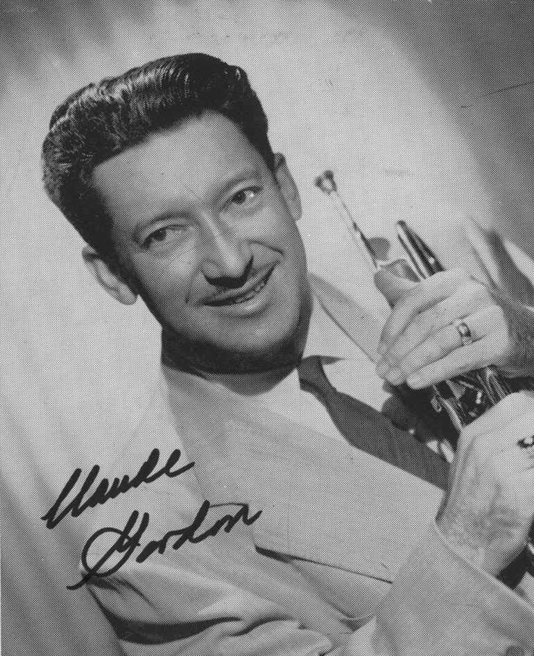 Claude Gordon headshot with trumpet