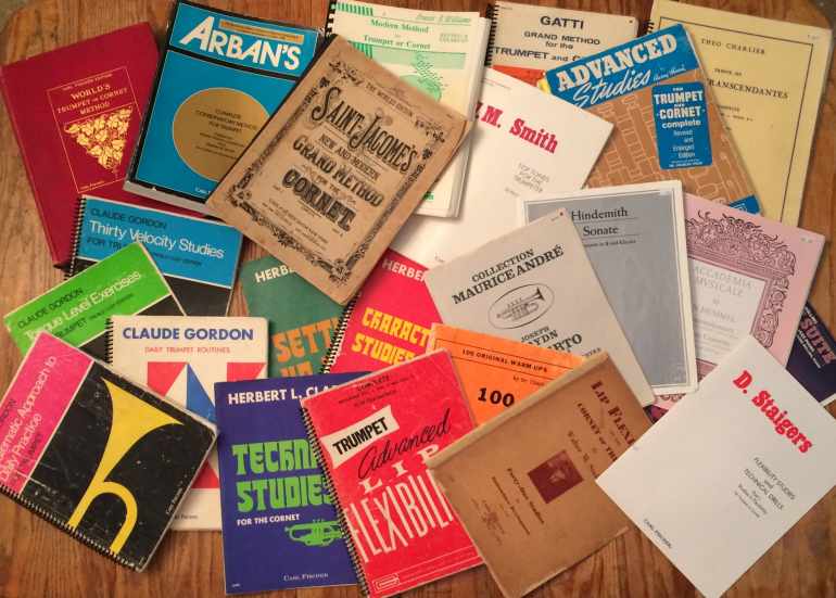 What to Practice - photo of various trumpet and brass method books and solos