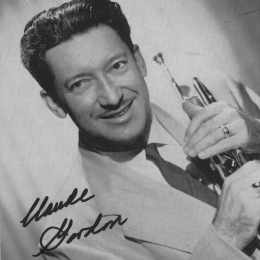 Claude Gordon headshot with trumpet